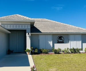 Accordion hurricane shutters installed on a Southwest Florida home