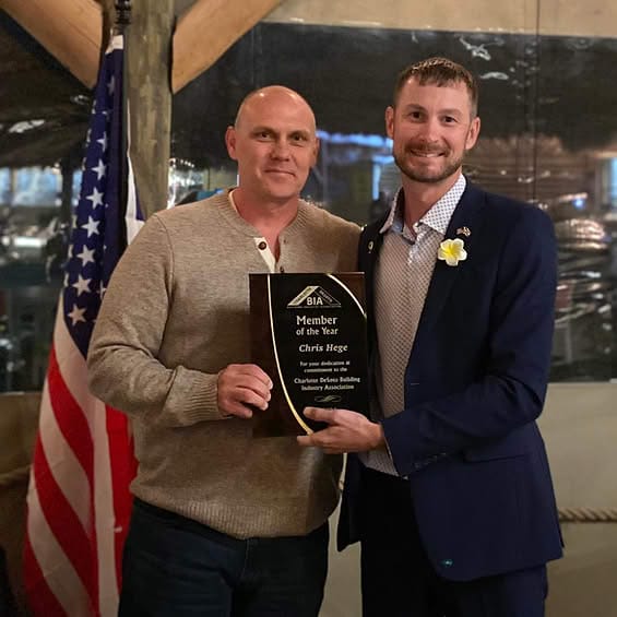 Chris Hege receiving the 2024 Charlotte DeSoto Building Industry Association Member of the Year Award