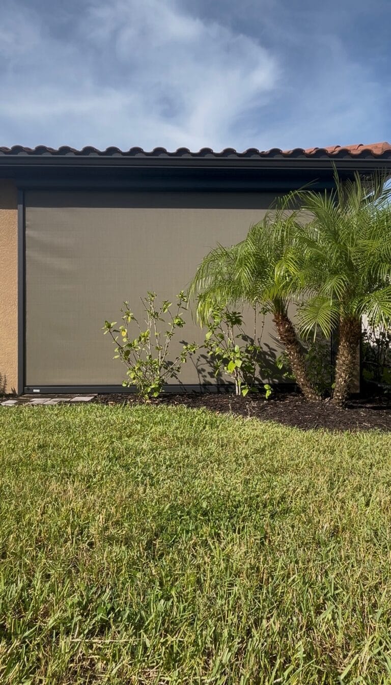 Large retractable hurricane screen installed on an outdoor living area
